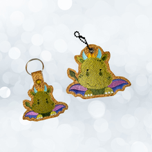 Load image into Gallery viewer, Green Baby Dragon Eyelet And Snap Tab machine embroidery design