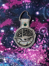 Load image into Gallery viewer, Baby Yoda with inscription hey baby Snap Tab machine embroidery design - Mandalorian