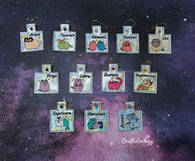 Load image into Gallery viewer, Gemini Zodiacs Snap Tab machine embroidery design