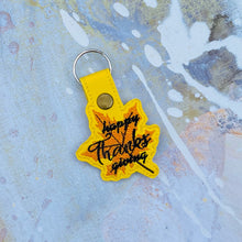 Load image into Gallery viewer, Happy Thanksgiving In Maple Leaf Snap Tab machine embroidery design