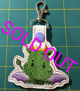Green Baby Dragon Eyelet And Snap Tab machine embroidery design