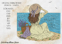 Load image into Gallery viewer, Digital embroidery design preview featuring a woman in a cream dress and straw hat sitting by the blue sea, with a basket of lavender and a purple throw. Text on the left lists formats DST, EXP, HUS, JEF, PES, VP3, XXX and says DIGITAL EMBROIDERY DESIGN - 3 SIZES.