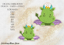 Load image into Gallery viewer, Green Baby Dragon Eyelet And Snap Tab machine embroidery design