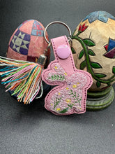 Load image into Gallery viewer, Easter Bunny With Plants Snap Tab machine embroidery design