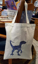 Load image into Gallery viewer, Blue Velociraptor machine embroidery design on the bag